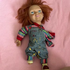 Collectible chucky doll missing leg and arm